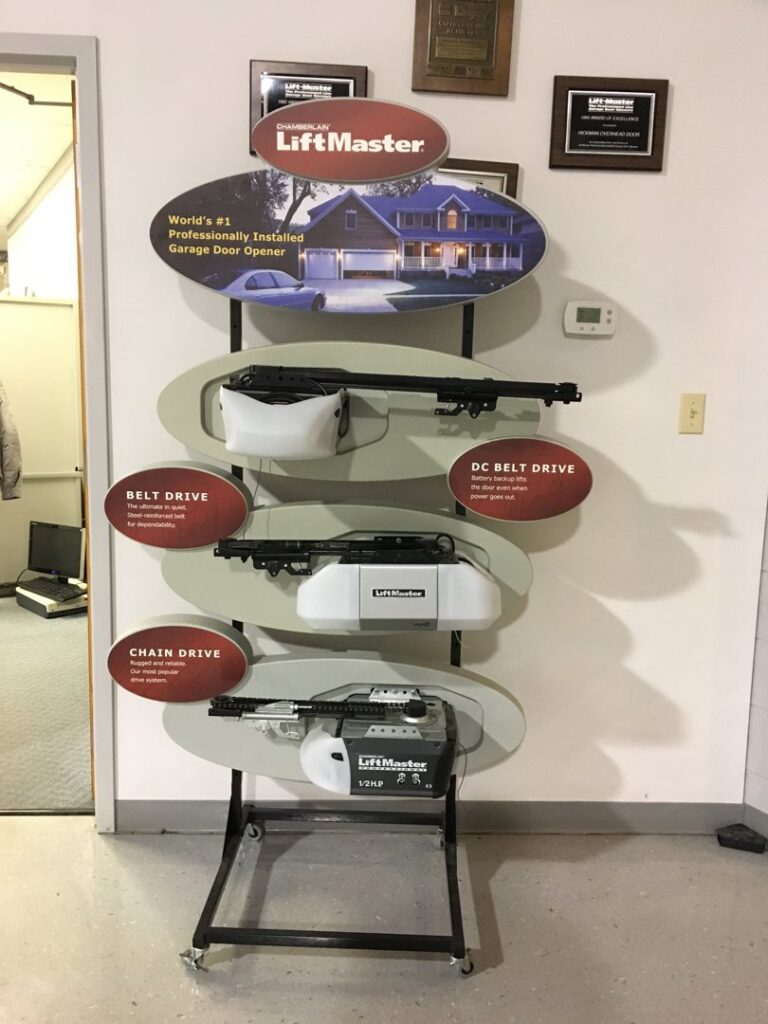 A display of LiftMaster garage door openers, including belt and chain drive models, at Hickman Overhead Door in Milford, DE.