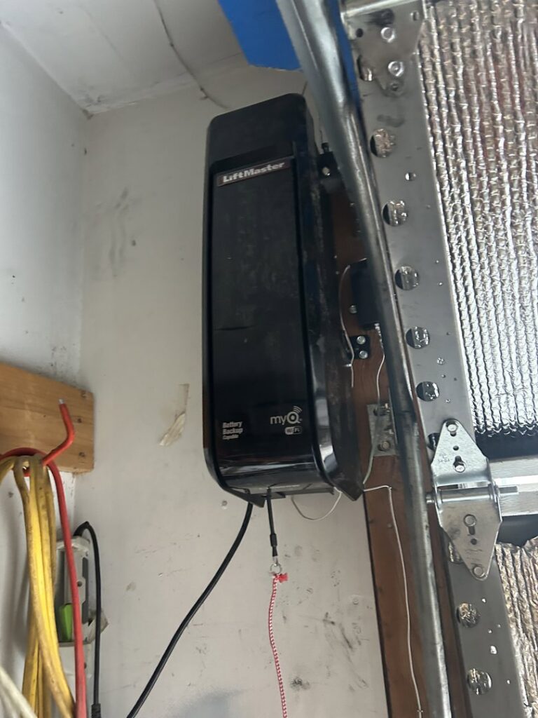 A close-up of a LiftMaster side-mount garage door opener, expertly installed by Delta Garage Door in Millcreek, UT.
