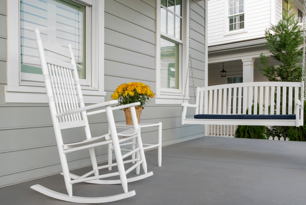 A house featuring light grey horizontal siding, showcasing quality work by Ideal Siding Nashville, TN.