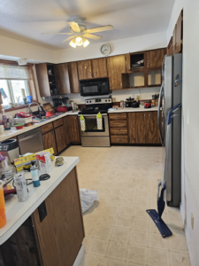 A messy kitchen before professional cleaning by Nikki Sue's Cleaning Services in Gillette, WY.