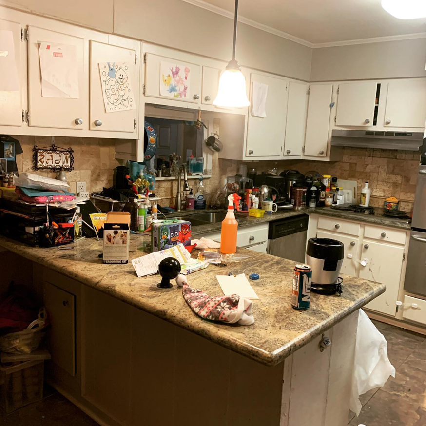 A cluttered kitchen counter before a professional house cleaning service by Keeks Kleaning LLC in Baton Rouge, LA