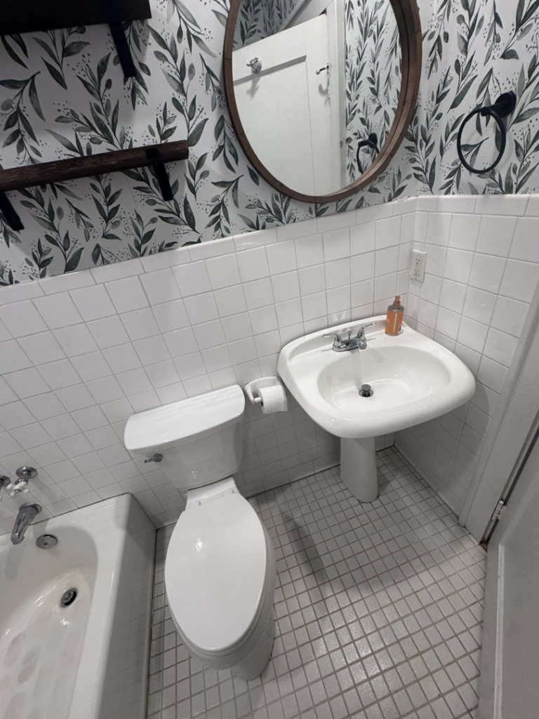 A meticulously cleaned bathroom with a white sink and toilet, reflecting the quality of Pristine Cleaning Services in Thornton, CO.