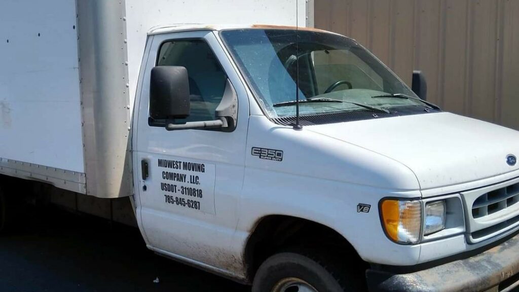 A Midwest Moving Company LLC. truck parked, showcasing their professional moving services in Topeka, KS.