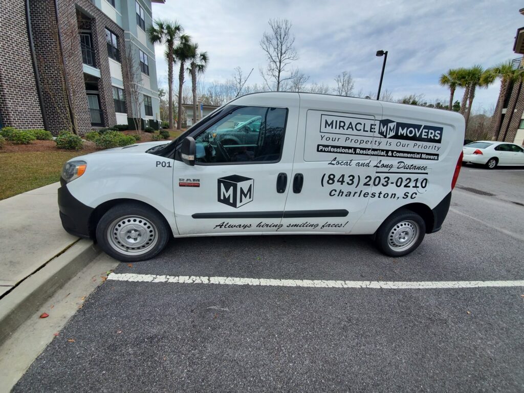 A branded Miracle Movers of Charleston, SC van parked, ready for moving services in Summerville, SC.
