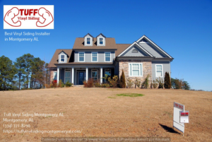 A modern residential house featuring gray vinyl siding and stone accents, installed by Tuff Vinyl Siding Montgomery Al in Montgomery, AL.