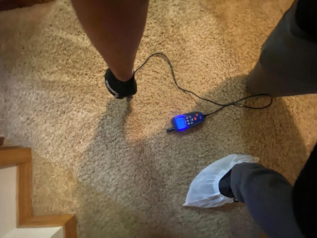 A moisture meter used to detect water damage in carpet by Brothers Restoration technicians in Post Falls, ID.