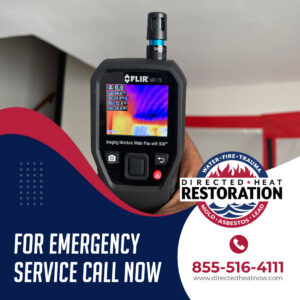 A technician uses a FLIR moisture meter to detect hidden water damage at Directed Heat Restoration in Livonia, MI.