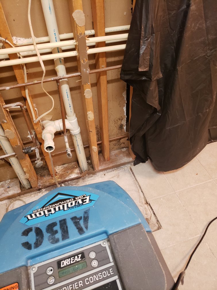 Mold remediation and water damage drying in progress with a dehumidifier by ABC Cleaning and Restoration in Harvest, AL.