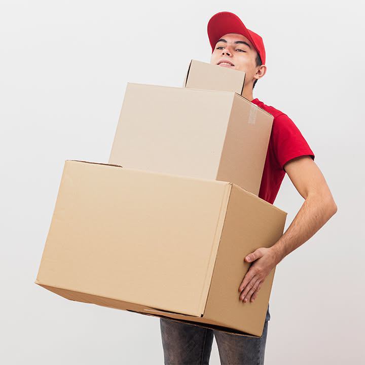 A mover carrying a stack of moving boxes for Delivery on Demand in Scottsdale, AZ
