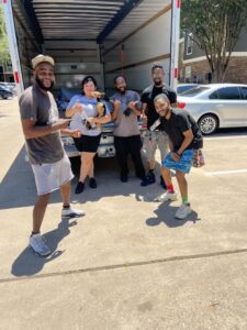 The allpromovingservice moving team posing by their truck after a job in San Antonio, TX.
