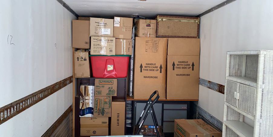 A moving truck fully loaded with moving boxes, showcasing the packing service of Gifted Hands Moving & Storage in Collierville, TN.