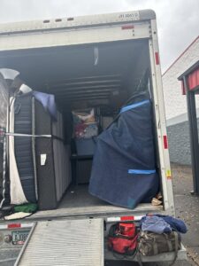 Inside a moving truck, securely packed with furniture and boxes by Gifted Hands Moving & Storage in Collierville, TN.