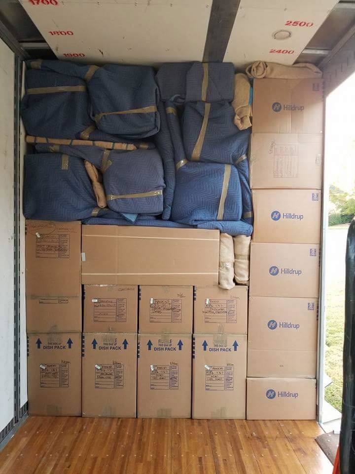 An interior view of a moving truck packed with household items by Moving Pros LLC in Surprise, AZ.