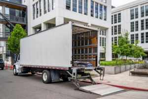 A white moving truck with its ramp down, ready for loading or unloading, for Central Movers, Inc. in Annapolis, MD.