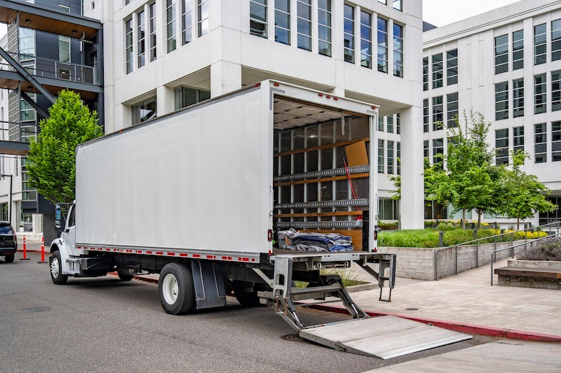 A white moving truck with its ramp down, ready for loading or unloading, for Central Movers, Inc. in Annapolis, MD.