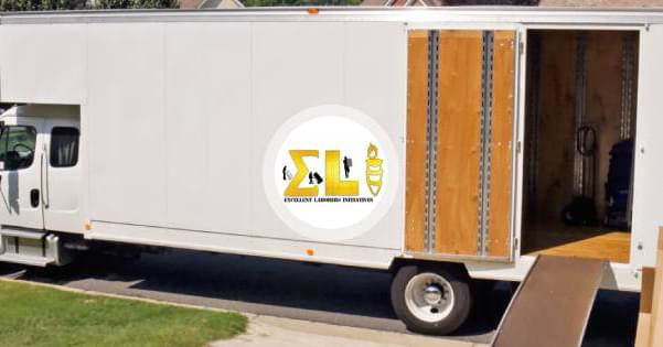 A white moving truck with its ramp extended, ready for loading or unloading by E.L.I Movers LLC in Houston, TX.