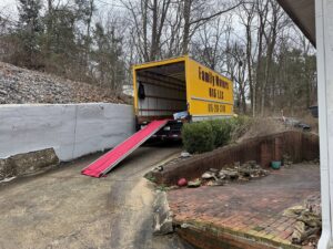 A Family Movers 615 LLC truck with a red ramp extended, ready for a moving job in Goodlettsville, TN.