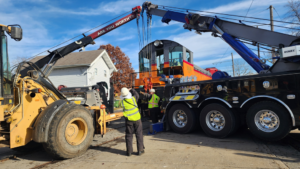 Elmquist Towing & Recovery performing a multi-vehicle heavy recovery operation for a train in Ames, IA.