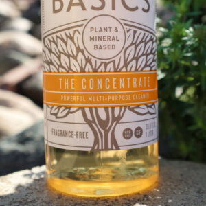 Close-up of a Branch Basics 'The Concentrate' bottle, highlighting natural cleaning products used by Natural Clean in Sioux Falls, SD.