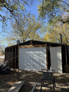 New white garage door installation by Above All Garage Doors in Kansas City, KS.
