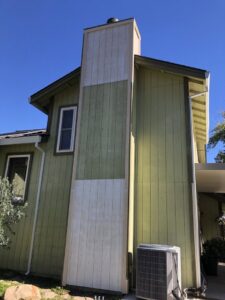 New vertical siding panels installed on a chimney by Good Life Construction Inc in North Highlands, CA