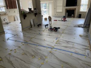 New tile being installed as part of a water damage reconstruction project by Paul Davis of Eastern Ohio in Youngstown, OH.