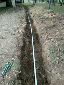 New water line installation in a trench by Clog Busterz Plumbing Services in Richmond, KY.