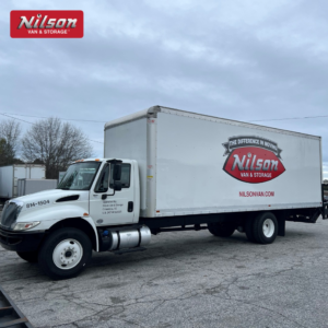 A Nilson Van and Storage moving truck parked in a lot in Columbia, SC.