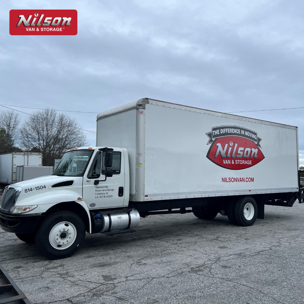 A Nilson Van and Storage moving truck parked in a lot in Columbia, SC.
