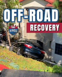 A car stuck in an embankment, illustrating off-road recovery services by Cali kings Towing in San Diego, CA.