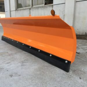 A close-up view of an orange snow plow blade, offered by Victory Tractor Implements in Long Beach, CA