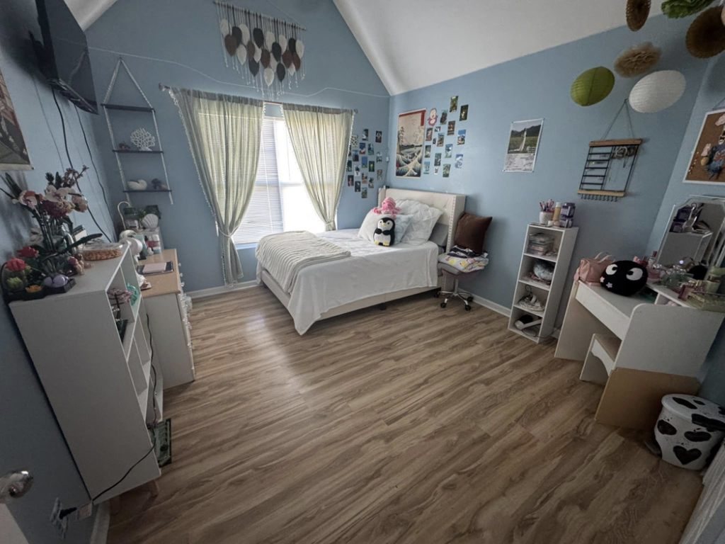 An organized and freshly cleaned bedroom, demonstrating the quality service from Maribel's Cleaning Services in Raleigh, NC.