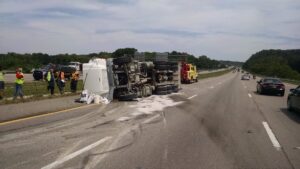 Bevis Towing performing an overturned semi-truck recovery on the side of a highway in Cincinnati, OH.