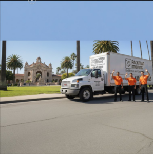 Packman Moving truck parked on a street with three friendly movers waving in San Diego, CA