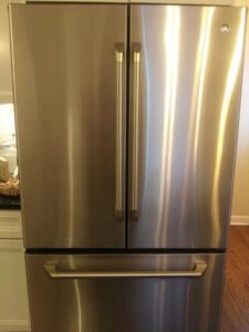 A polished stainless steel refrigerator, reflecting the high-quality cleaning service provided by Jessie Clean in Indianapolis, IN.