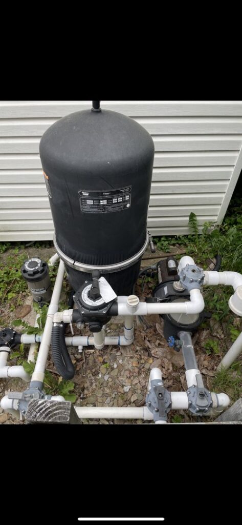 A comprehensive view of a pool equipment setup, showcasing the technical services offered by Chlorine Clean Pool Services in Wilmington, DE.