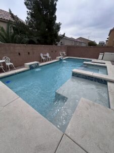 Several pool filter cartridges, indicating maintenance or replacement services provided by Aloha Pool Cleaning LLC in Las Vegas, NV.