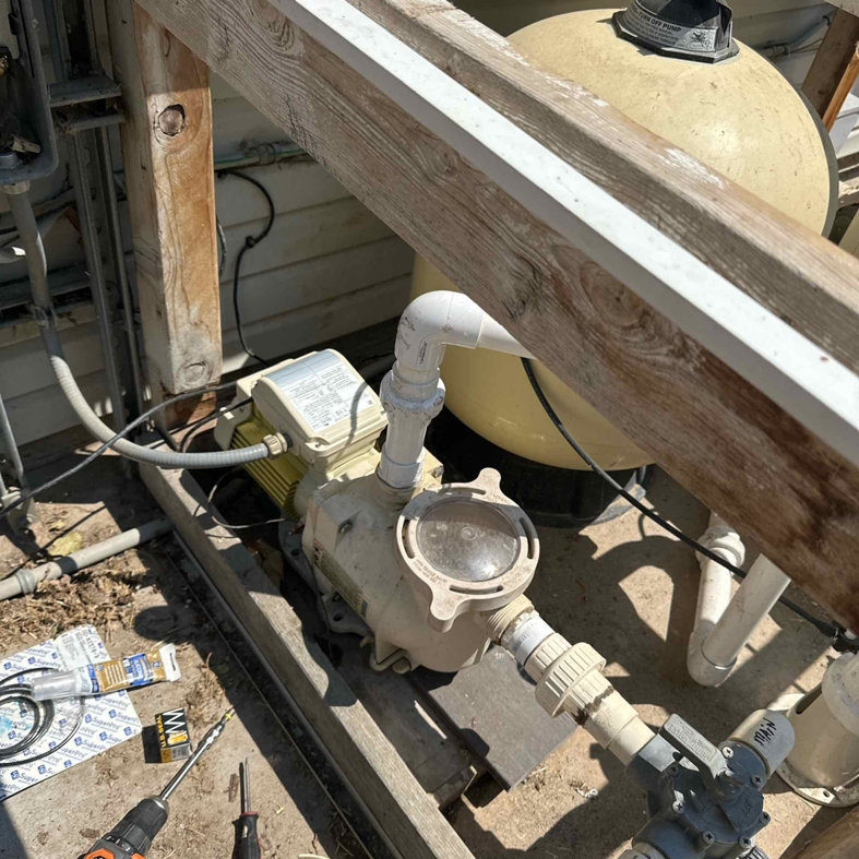 Close-up of pool filter and pump system maintenance by Retrowave Pool & Spa in Nampa, ID.