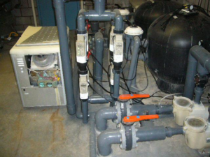 Pool filtration and heating equipment maintained by Fresh & Clear Pool Service Inc. for optimal performance in Henderson, NV.