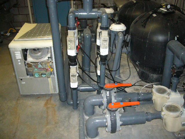 Pool filtration and heating equipment maintained by Fresh & Clear Pool Service Inc. for optimal performance in Henderson, NV.