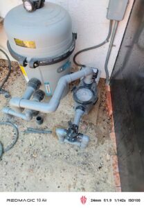 Pool pump and filter equipment being serviced by Suburban Pool Company in Germantown, WI.