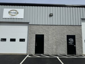 Exterior view of the Precision Garage Door Service of NC building with garage doors in Morrisville, NC.