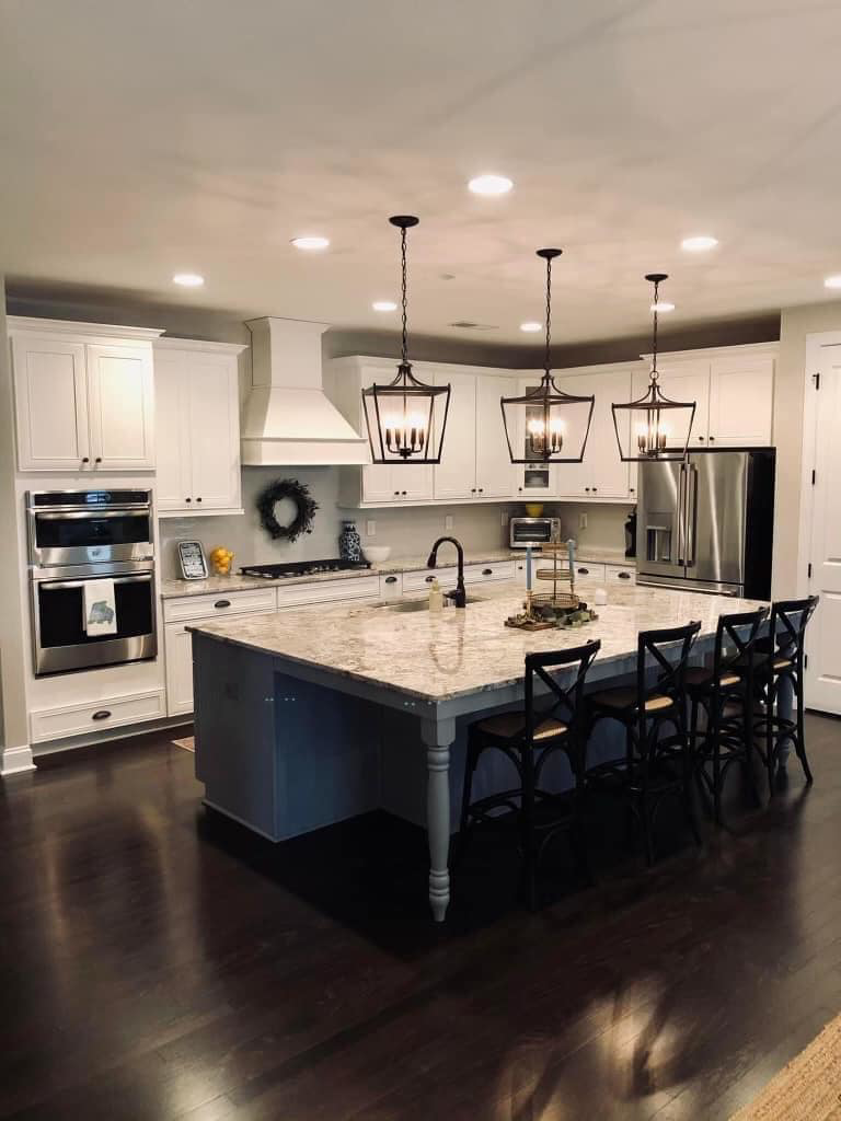 A pristine, modern kitchen with a large island, showcasing the cleaning services of Carolina Clean SC, LLC in Rock Hill, SC.