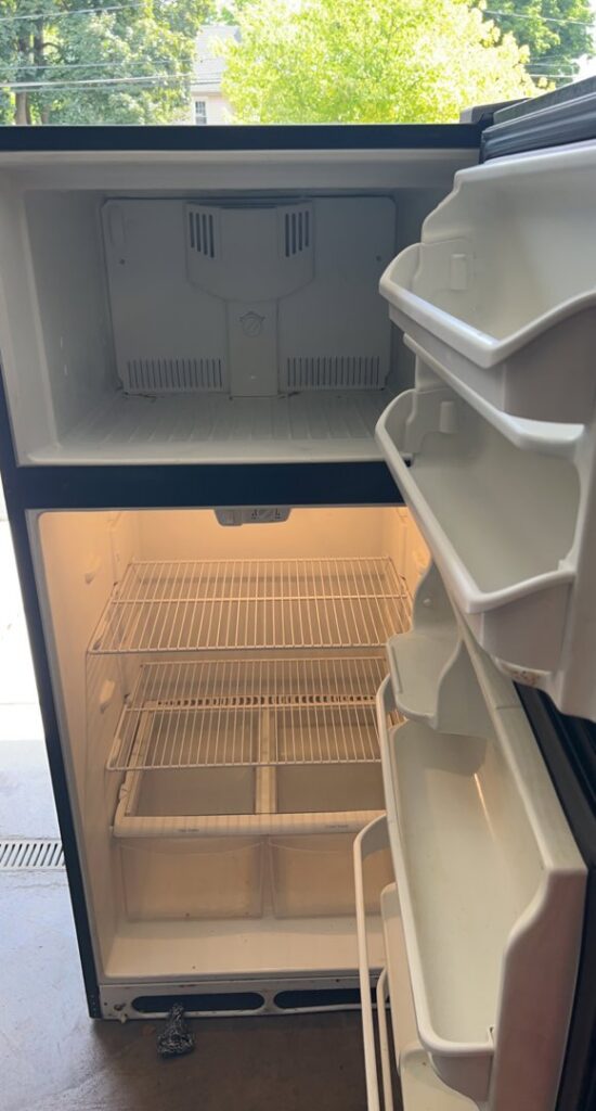 A professionally cleaned and organized refrigerator interior by City Cleaning Crew in Buffalo, NY.