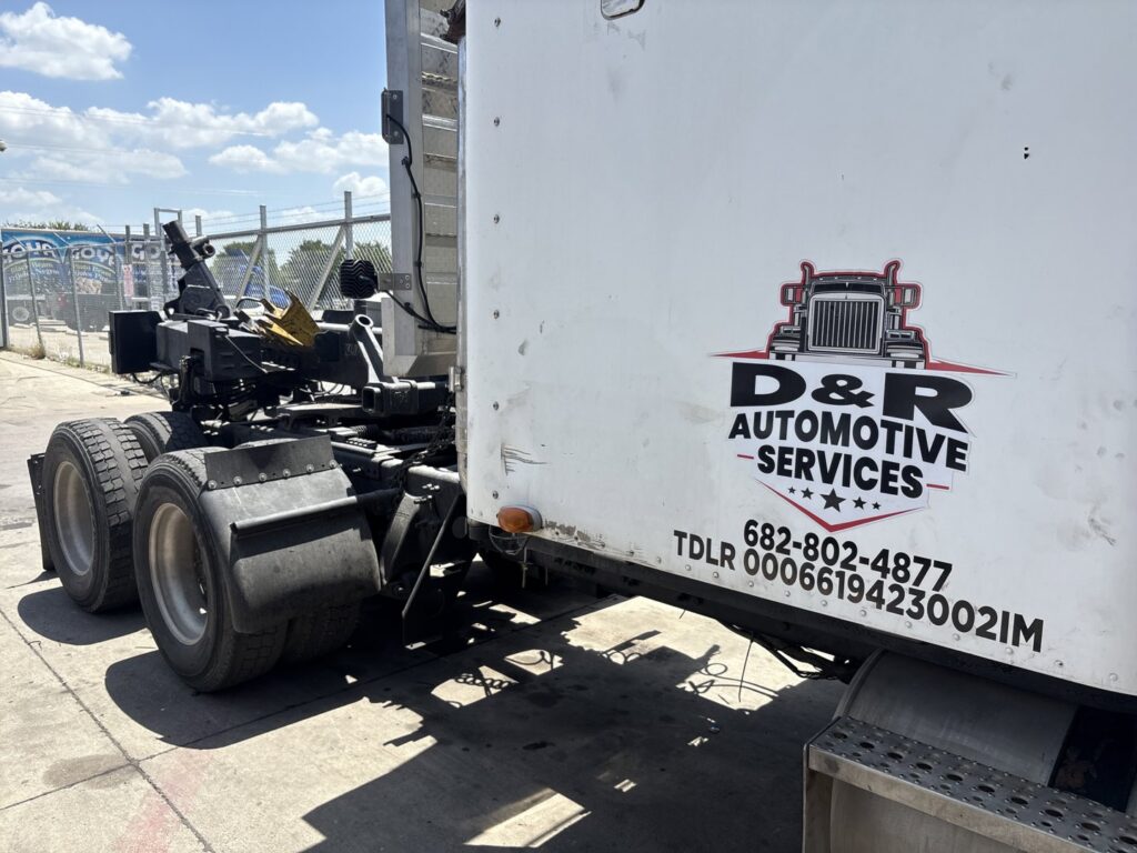 Rear view of a heavy-duty tow truck with specialized equipment from Dixon's Towing & Roadside Assistance in Dallas, TX.