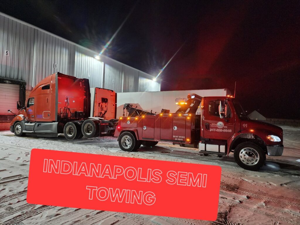 A red heavy-duty tow truck towing a semi-truck at night, providing Indianapolis semi towing services by JR's Services and Recovery, LLC in Indianapolis, IN.