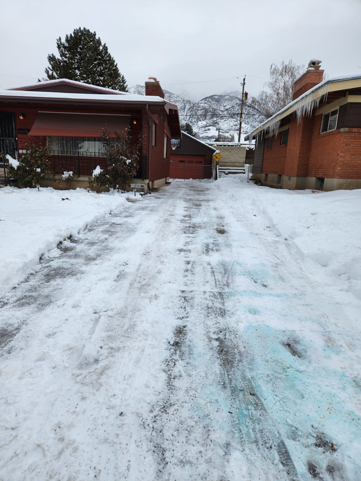 A residential driveway after snow removal and de-icing by JJ'S Lawn And Tree Services in Atlanta, GA.