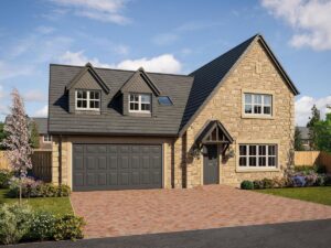 A residential house with a grey panel garage door installed by Up & Down Garage Doors in Bridgeport, CT.