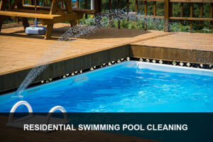 A pool vacuum cleaning a residential swimming pool, demonstrating services by Dave Rubinson Pools in Las Vegas, NV.