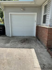 A white panel residential garage door installed by Garage Door Services, Inc. in Omaha, NE.